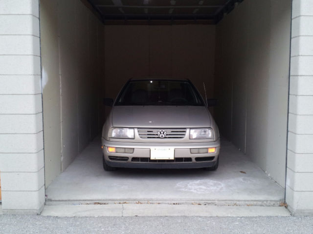 Secure automobile and vehicle storage unit with car parked inside at Warden Self Storage Scarborough